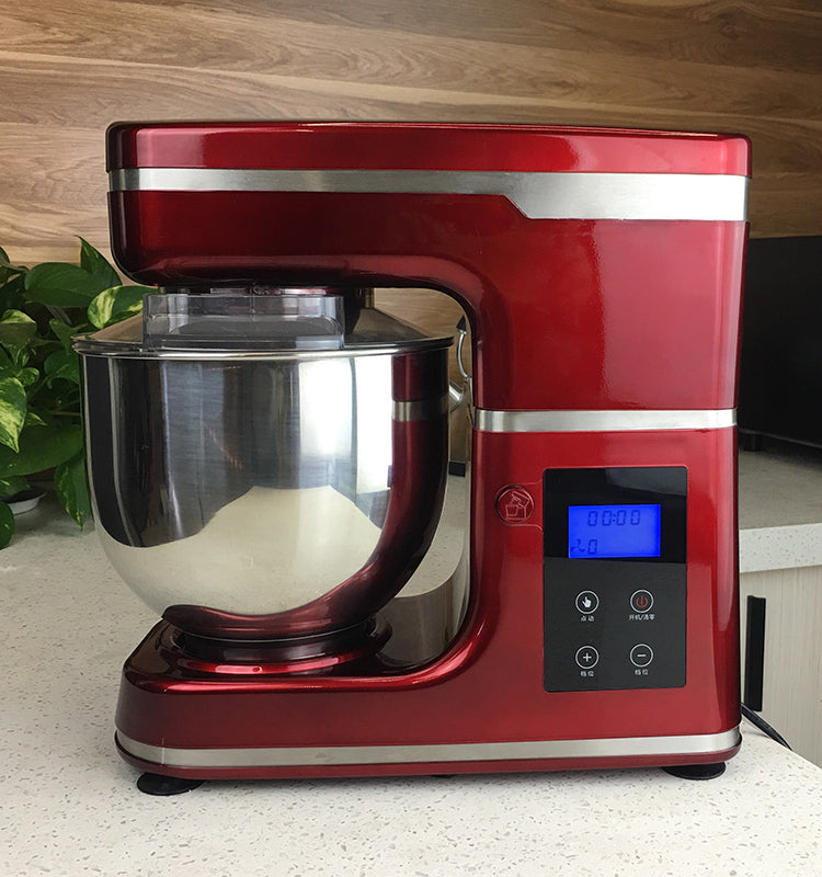 Weighing features stand mixer with bowl in kitchen