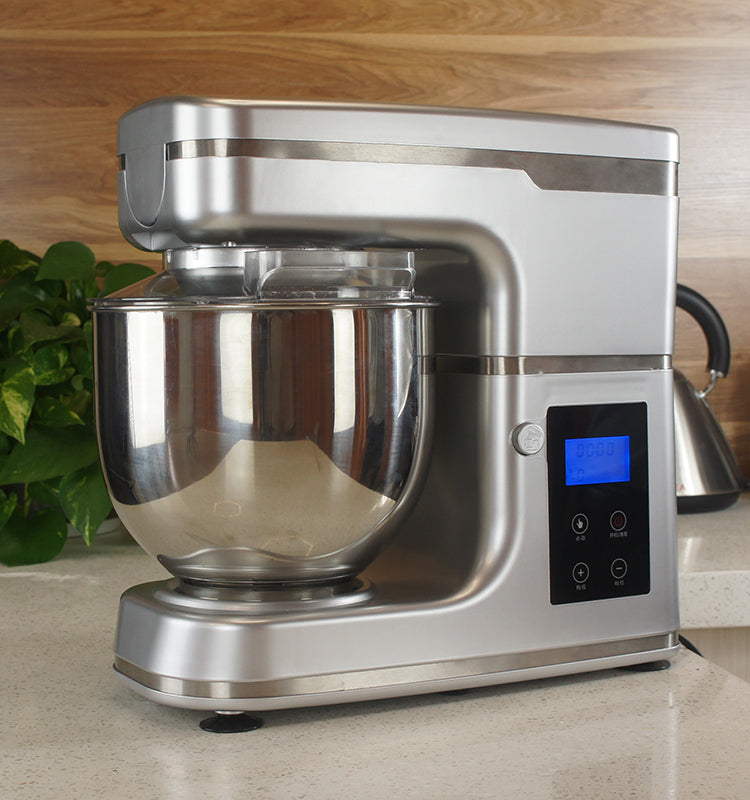 Weighing features stand mixer with bowl in kitchen